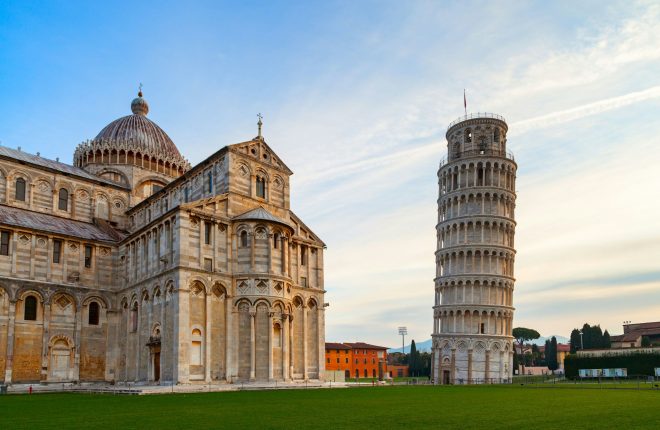 Scenic view of the Leaning Tower of Pisa and Pisa Cathedral in Italy on a sunny day